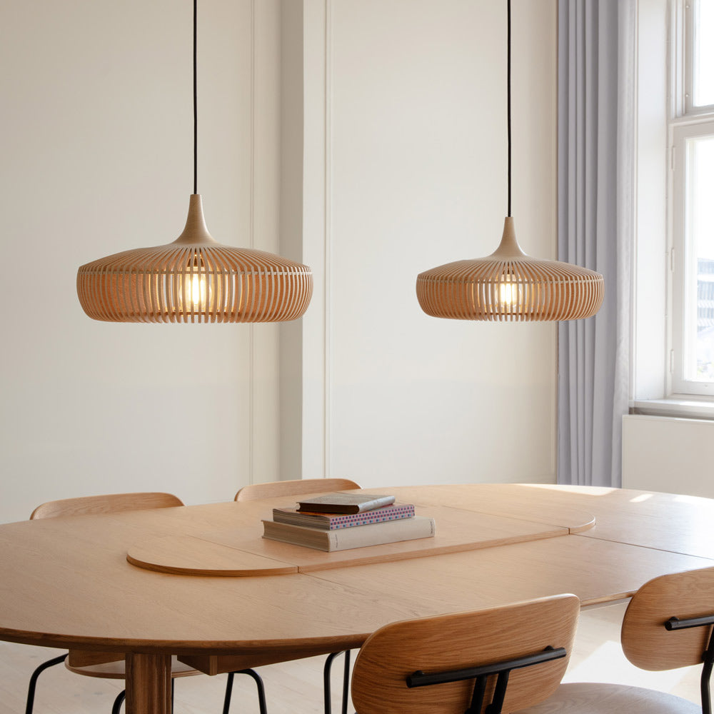 Clava Dine Wood Pendant Light in dining room.