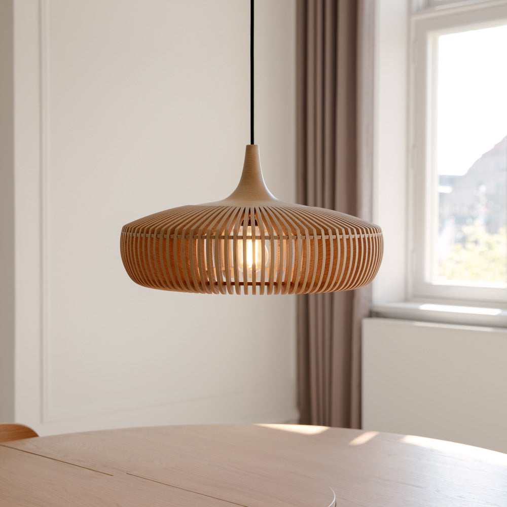 Clava Dine Wood Pendant Light in dining room.