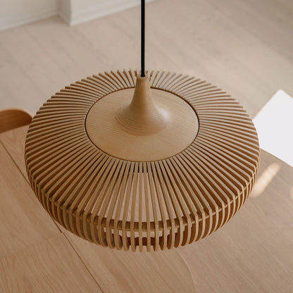 Clava Dine Wood Pendant Light in dining room.