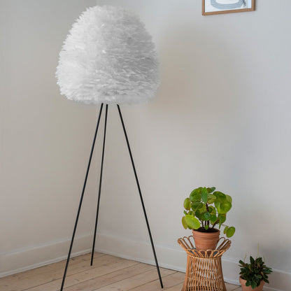 Eos Evia Tripod Floor Lamp in living room.