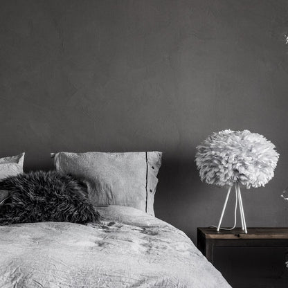 Eos Tripod Table Lamp in bedroom.