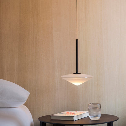 Bind LED Cone Tempo Track Pendant Light in bedroom.