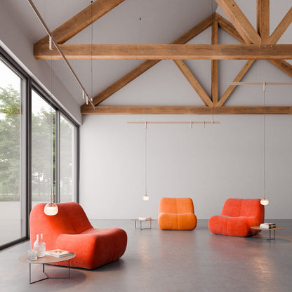Bind LED Single Tempo Track Pendant Light in living room.