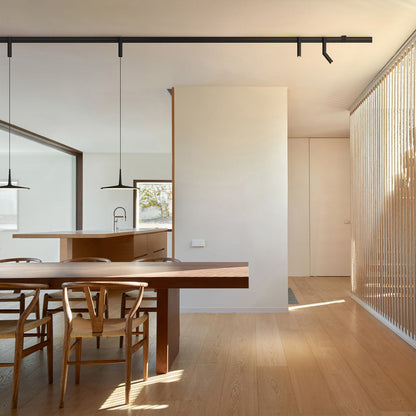 Bind LED Skan Track Pendant Light in dining room.
