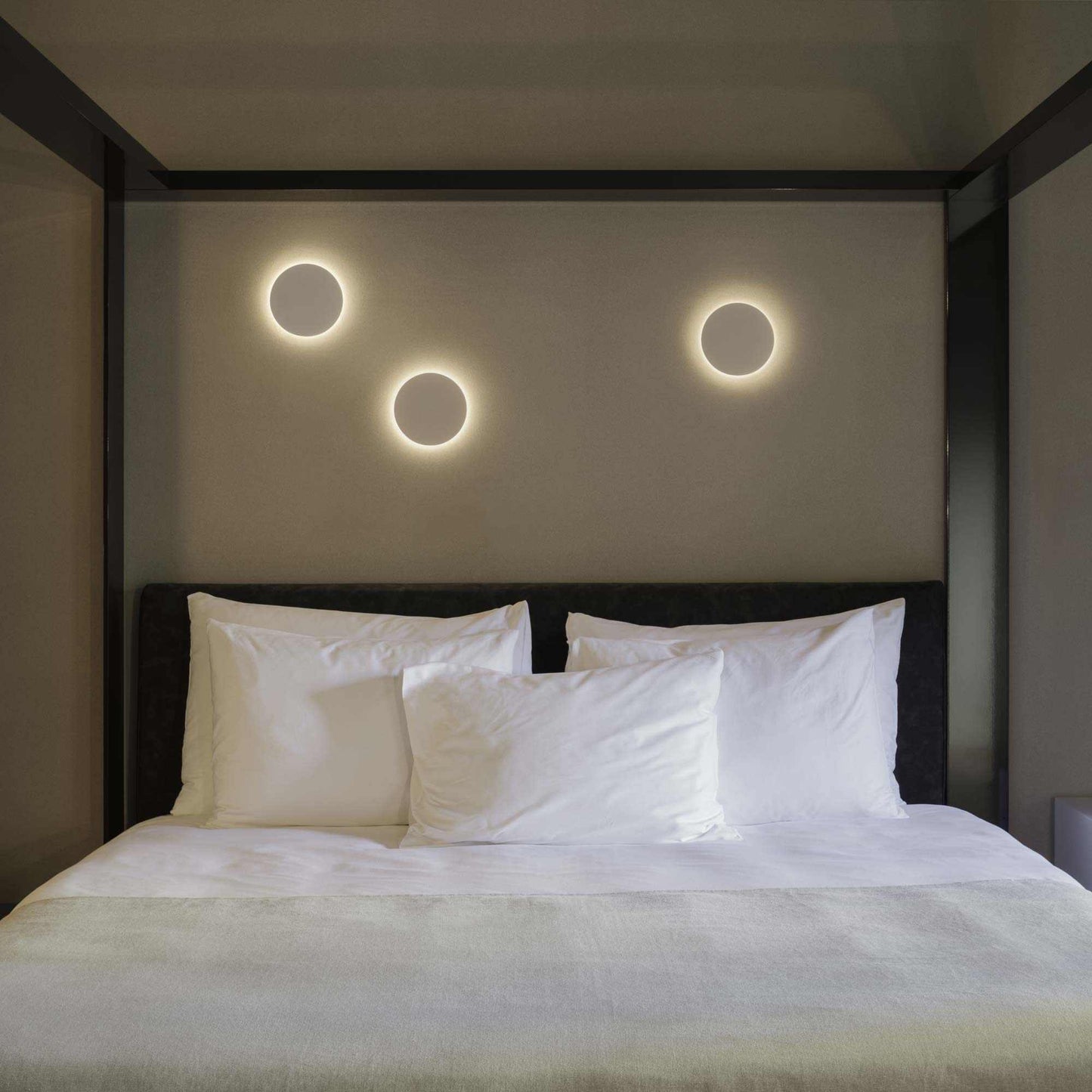 Dots LED Circular Wall Light in bedroom.