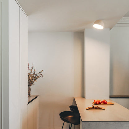 Plusminus Solo LED Flat Ceiling / Wall Light in dining room.