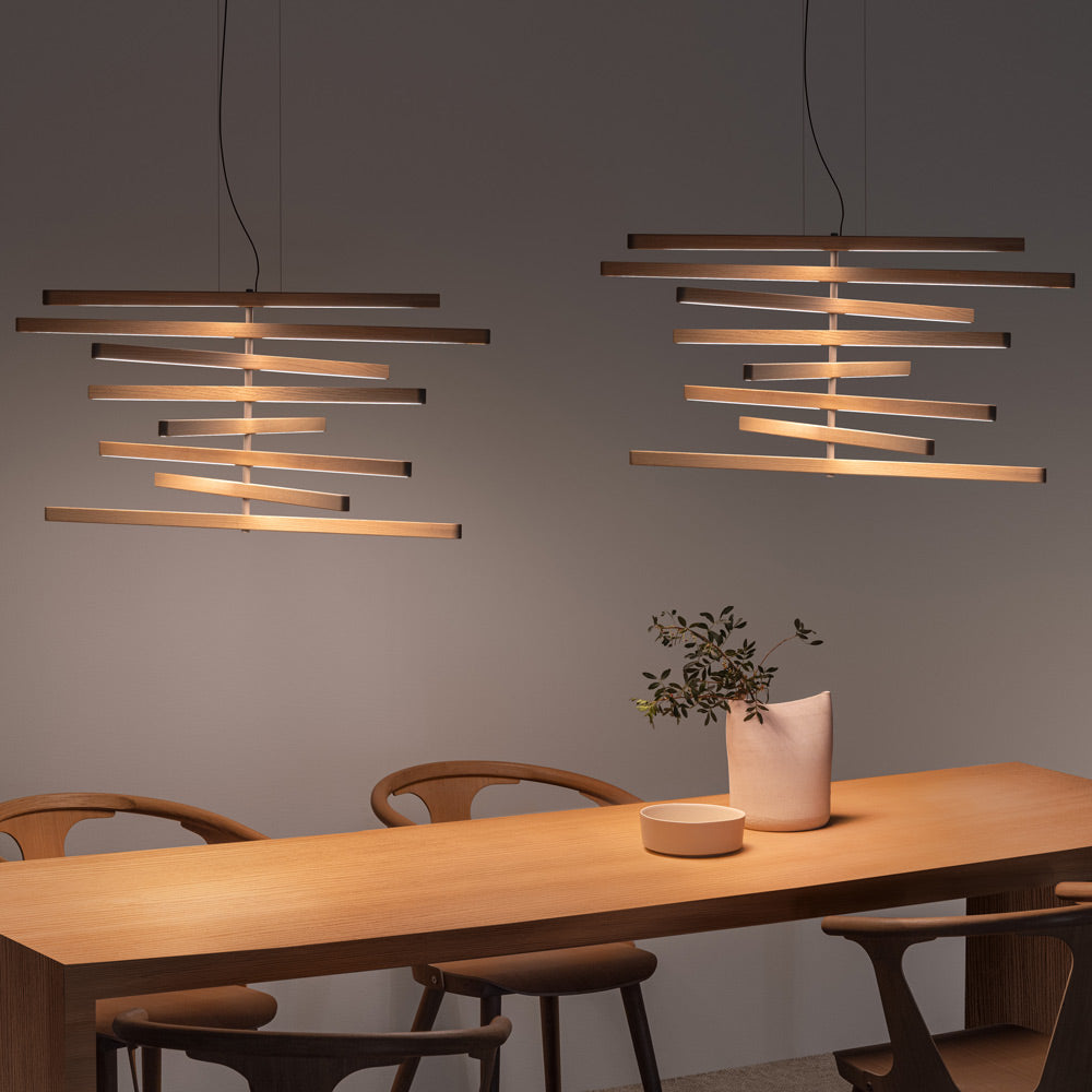Rhythm Wood Vertical LED Downlight Pendant Light in dining room.