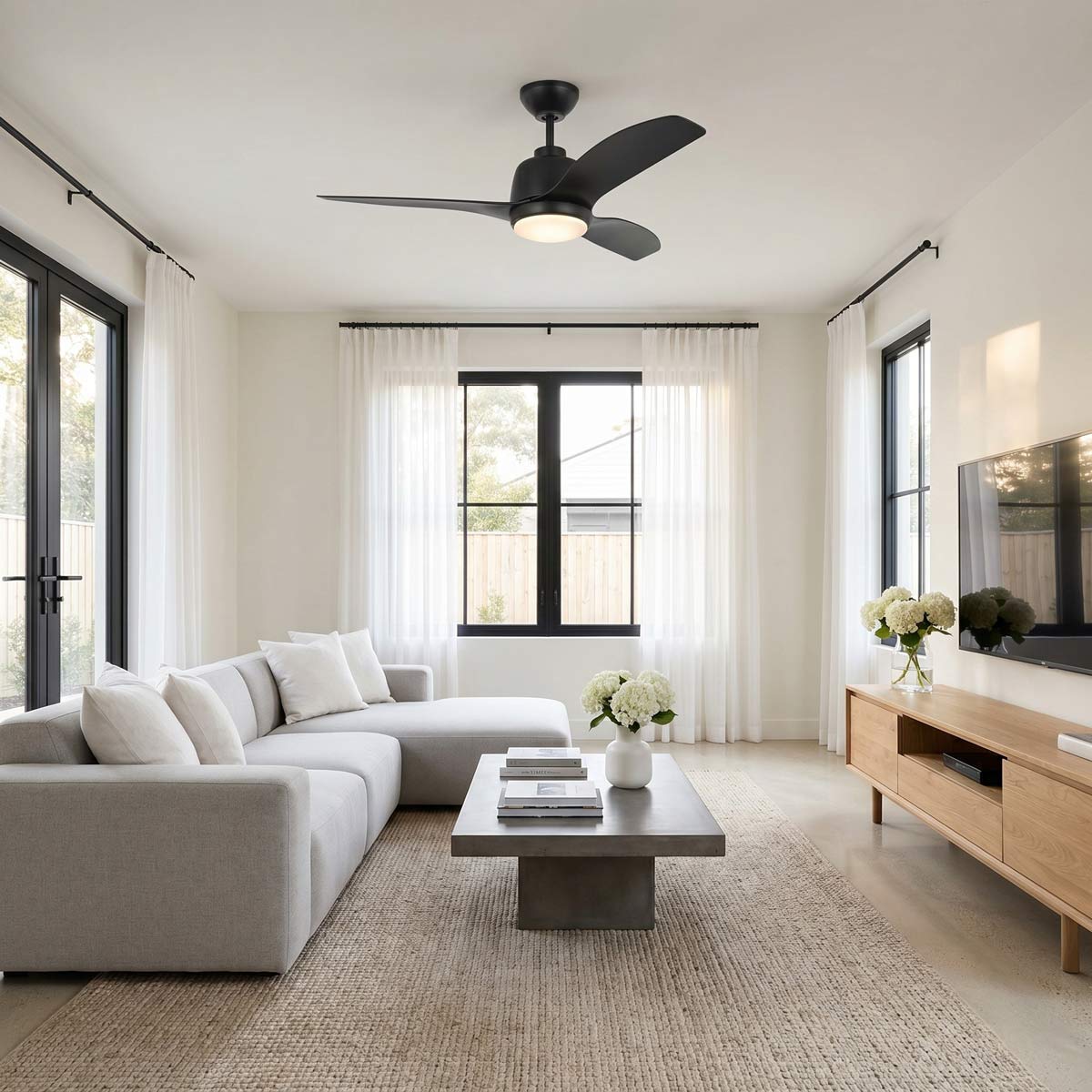 Avila Coastal Outdoor LED Ceiling Fan in living room.