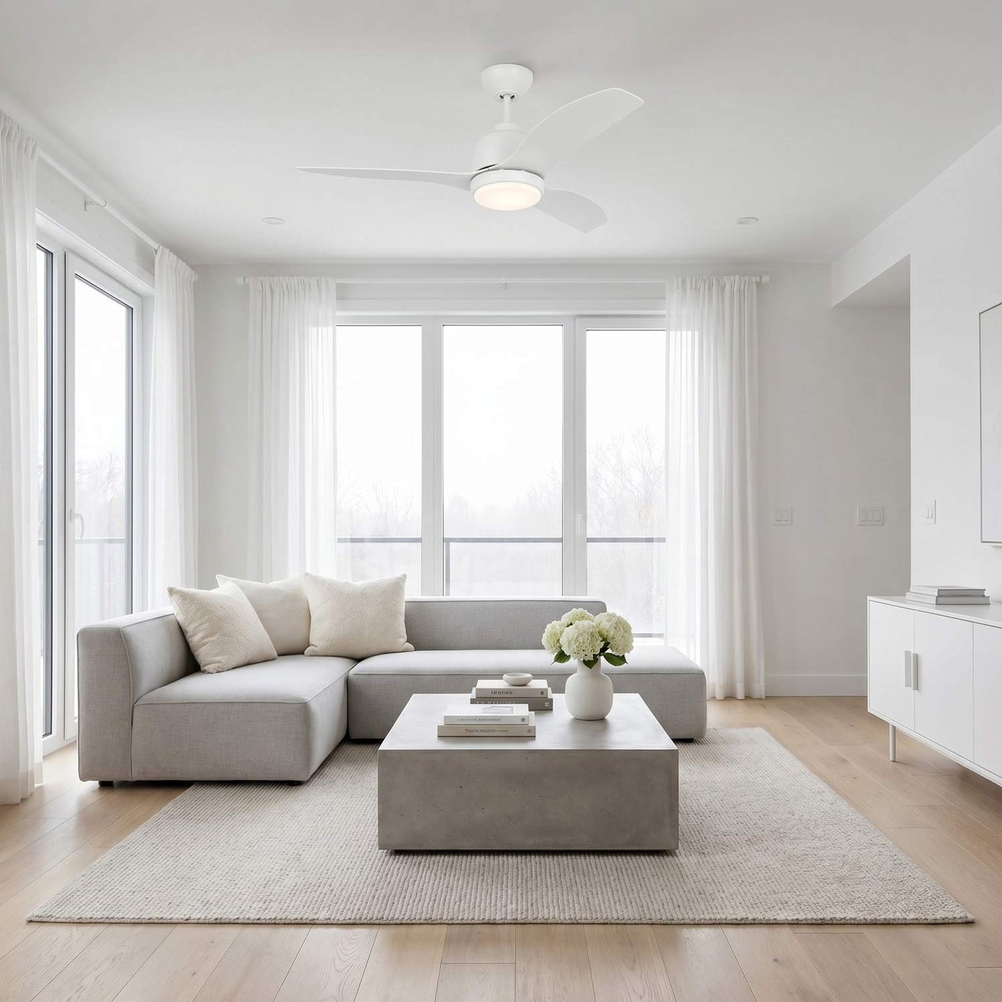 Avila Coastal Outdoor LED Ceiling Fan in living room.