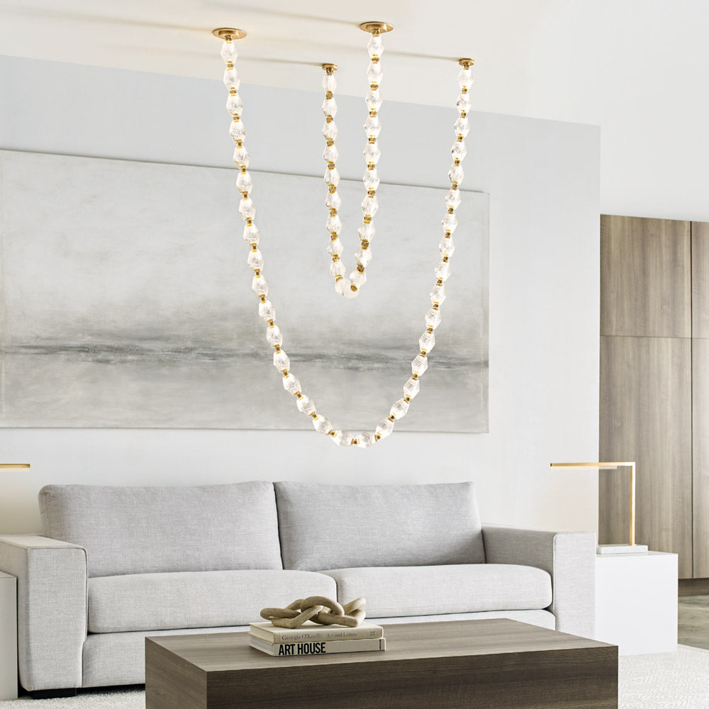 Collier LED Chandelier in living room.