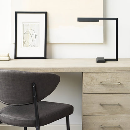 Dessau LED Table Lamp in office.