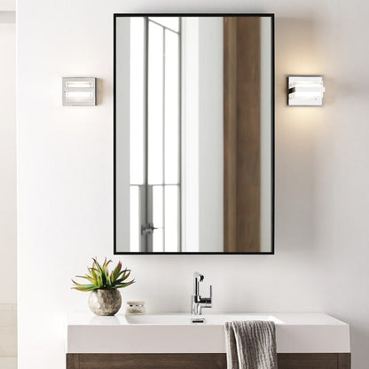 Kamden 1-Light LED Bath Wall Light in bathroom.