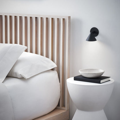 Midrand LED Wall Light in bedroom.