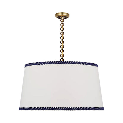 Evelyn Pendant Light in Hand-Rubbed Antique Brass and Natural Oak/Linen and Blue Berkeley Tape.