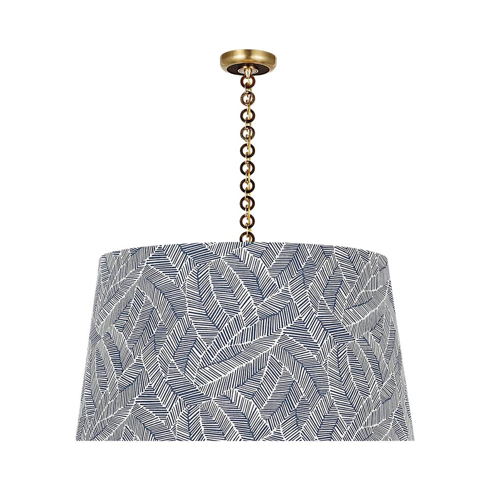 Evelyn Pendant Light in Hand-Rubbed Antique Brass and Natural Oak/Navy Abstract Leaf.