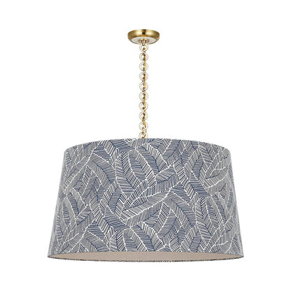 Evelyn Pendant Light in Hand-Rubbed Antique Brass and White Oak/Navy Abstract Leaf.