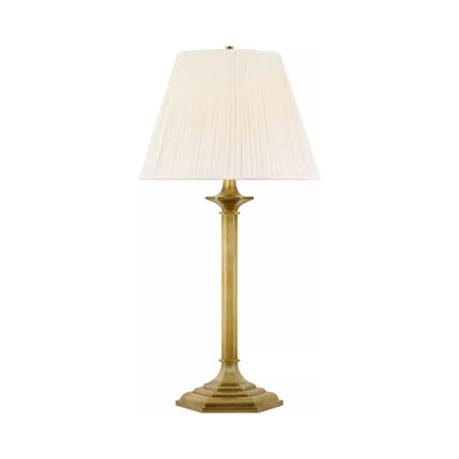 Irving Table Lamp in Natural Brass.