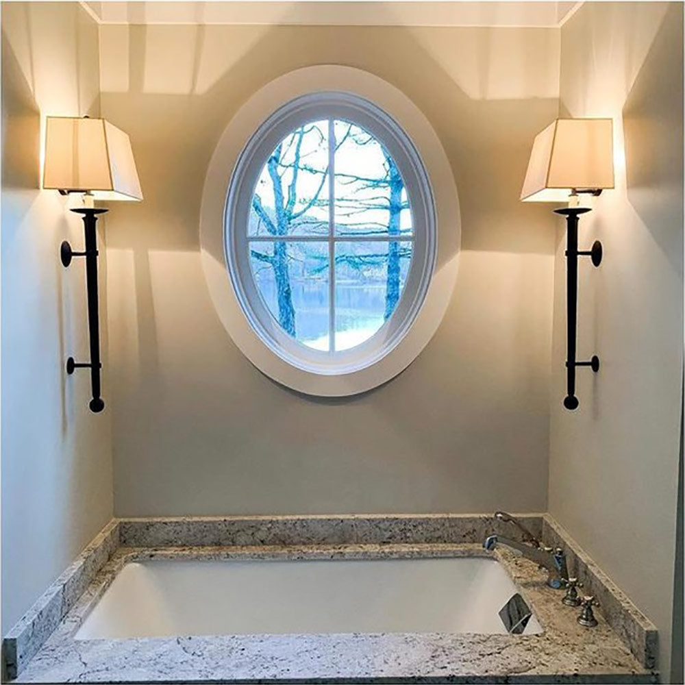 Long Iron Torch Wall Light in bathroom.