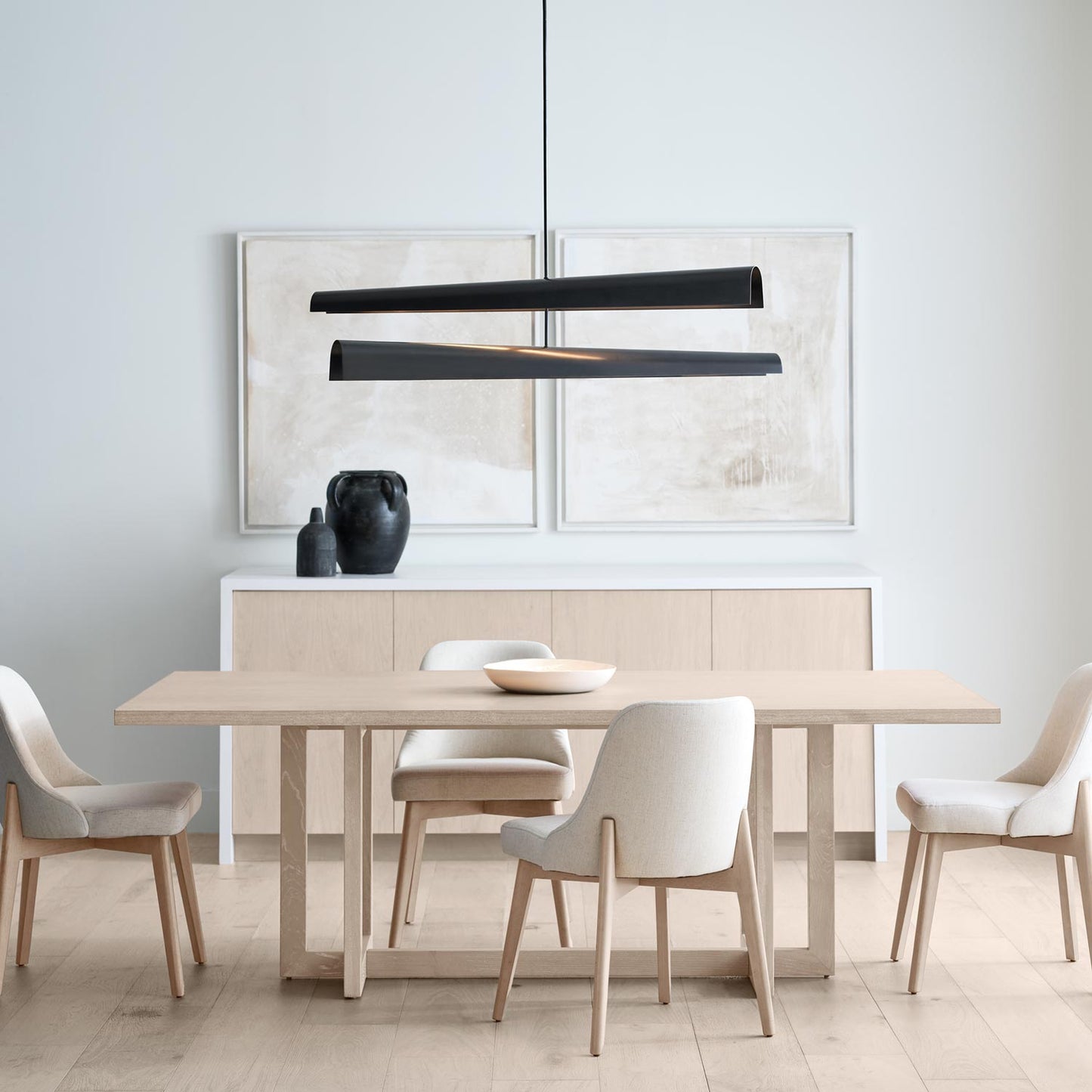 Piel LED Multi-Positional Chandelier in dining room.