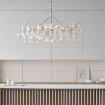 Talia LED Linear Chandelier in dining room.