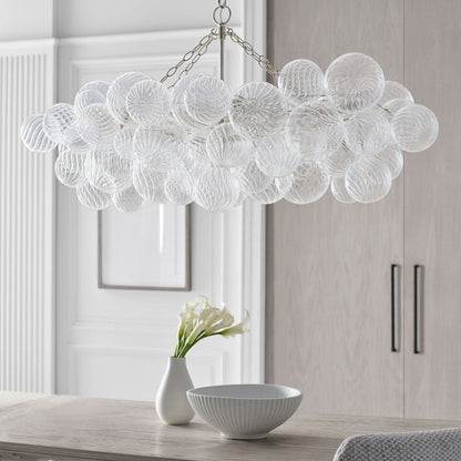 Talia LED Linear Chandelier in dining room.