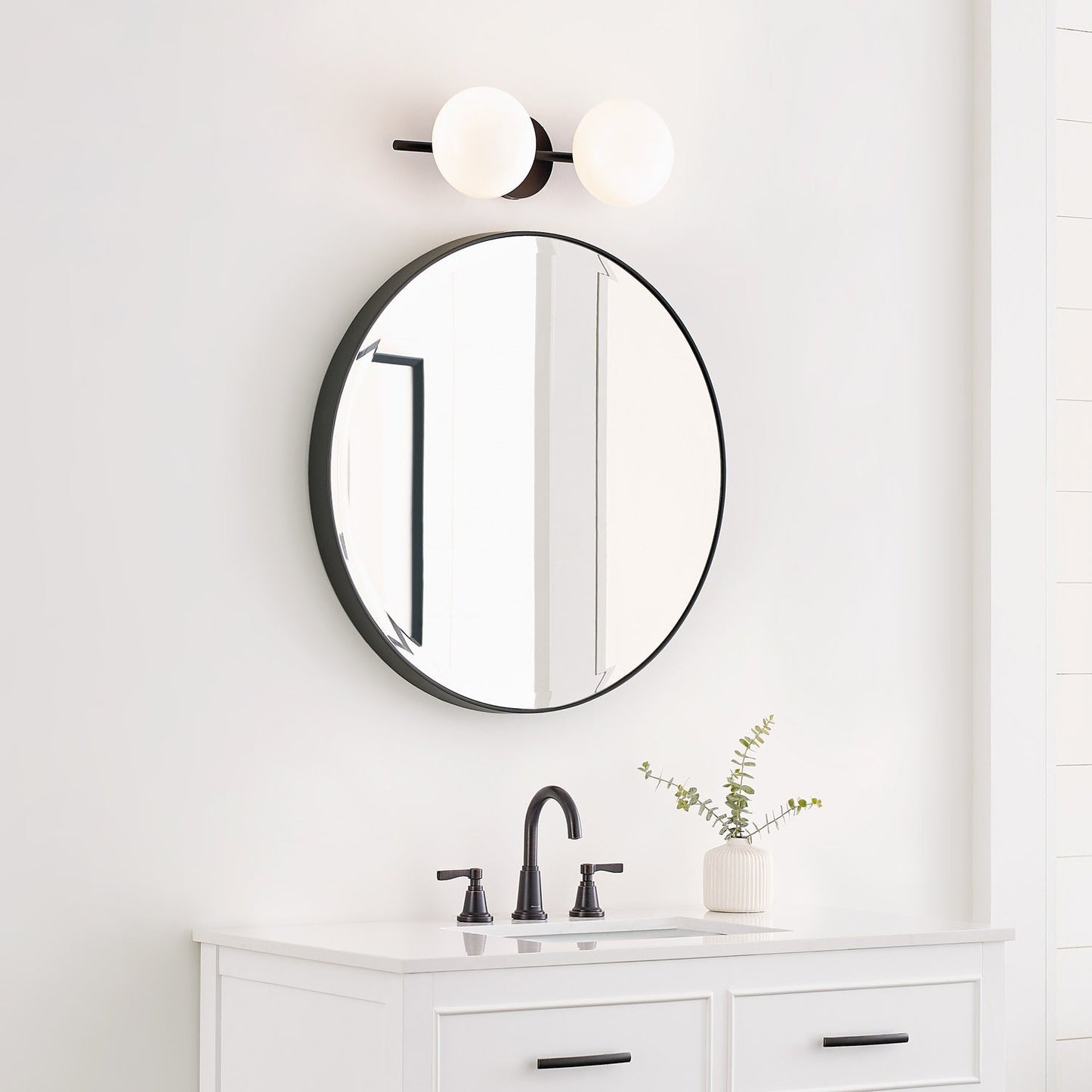 Lune LED Vanity Wall Light in bathroom.