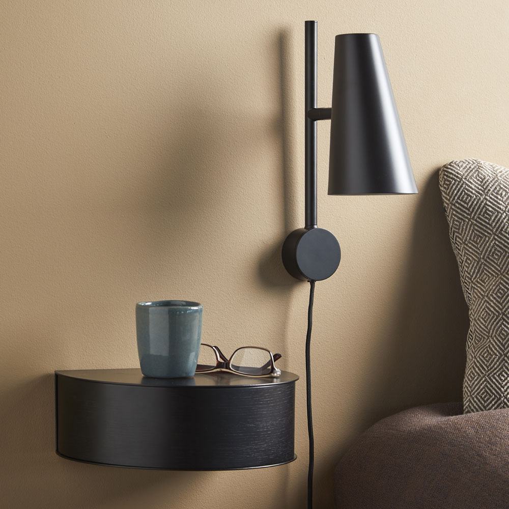 Cono Wall Light in bedroom.