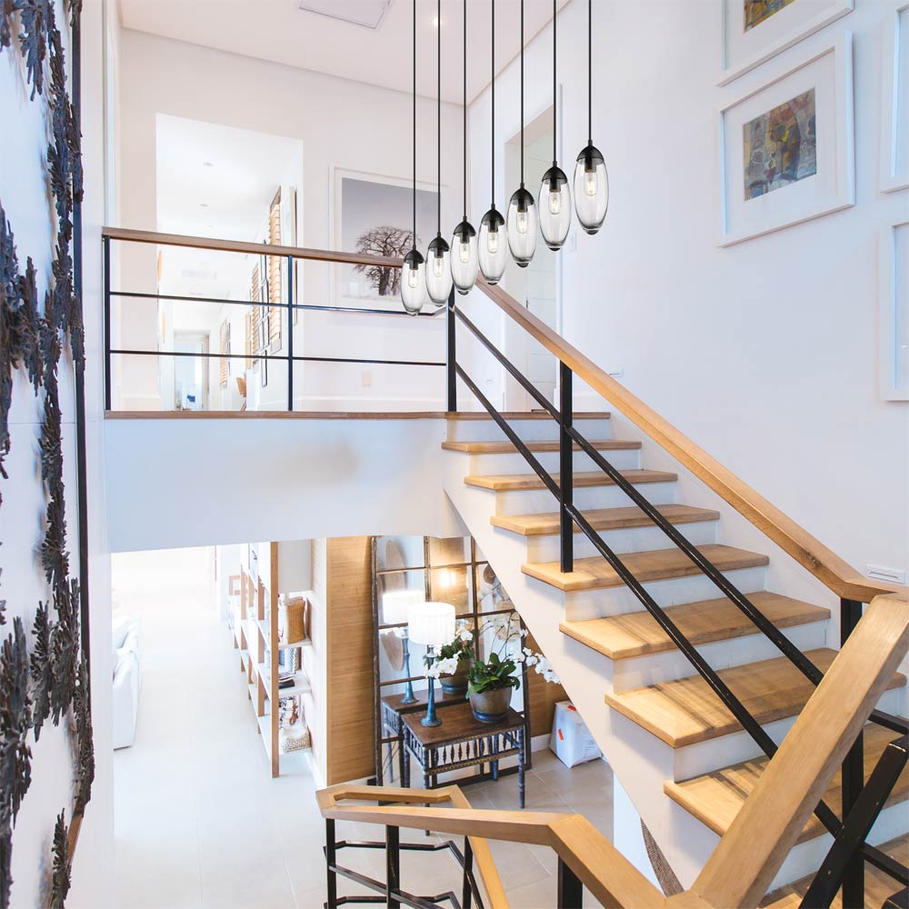 Arden Linear Chandelier in stairway.