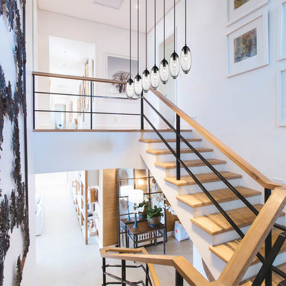 Arden Linear Chandelier in stairway.