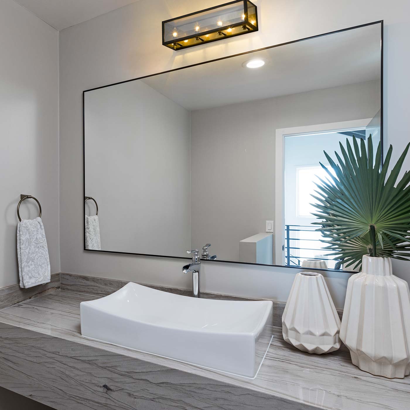 Infinity Bath Vanity Light in bathroom.