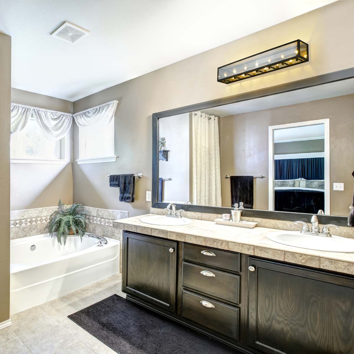 Infinity Bath Vanity Light in bathroom.