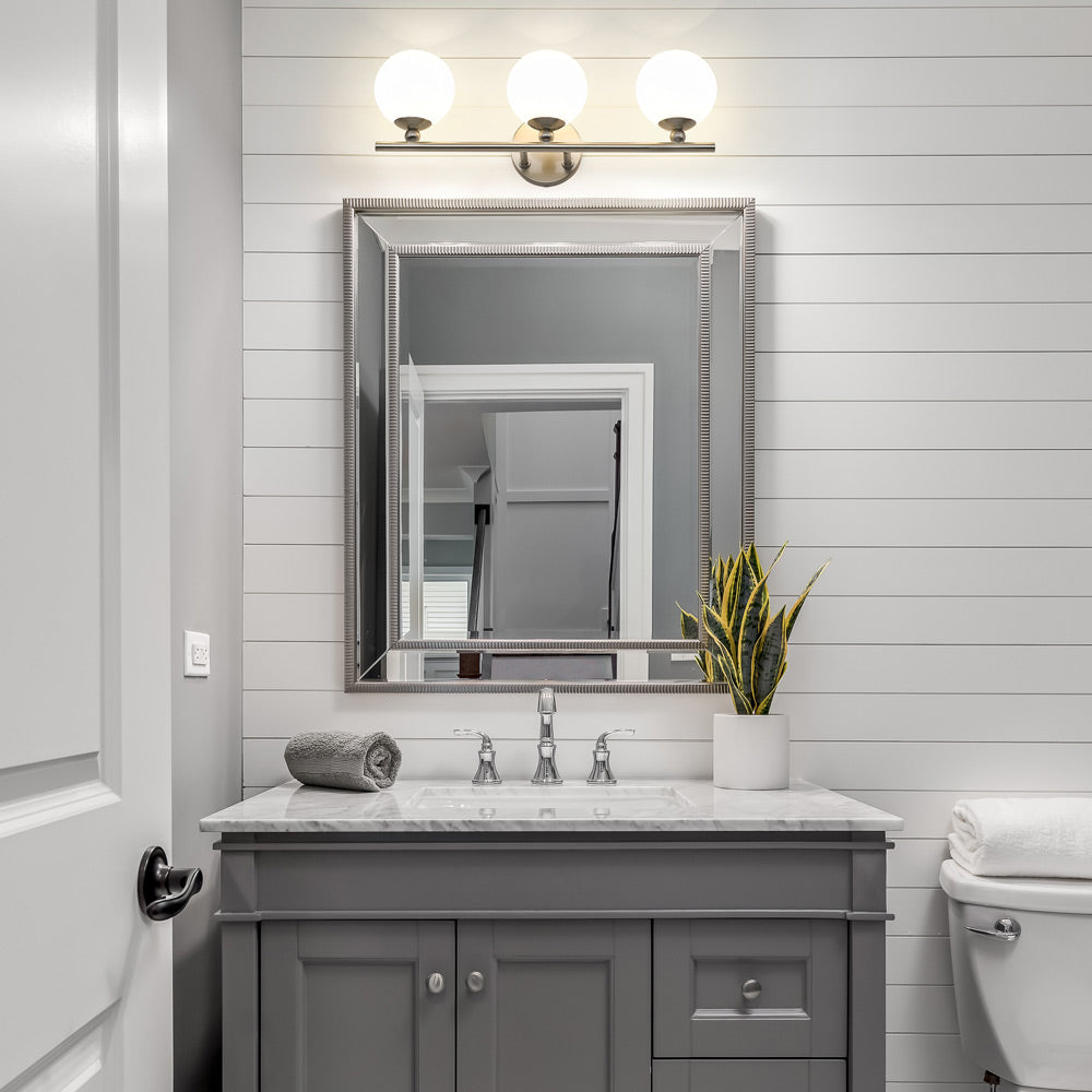 Neoma Bath Vanity Light in bathroom.