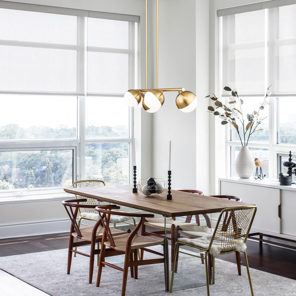 Realm Sphere Linear Chandelier in dining room.