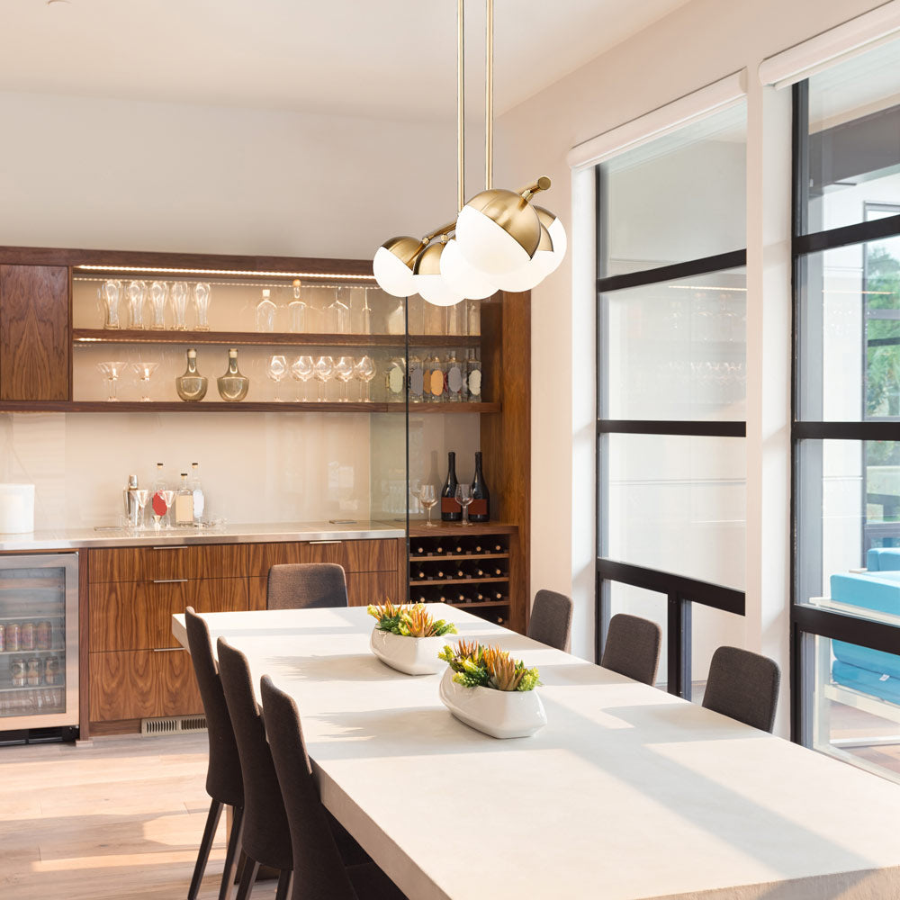 Realm Sphere Linear Chandelier in dining room.