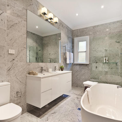 Tidal Bath Vanity Light in bathroom.