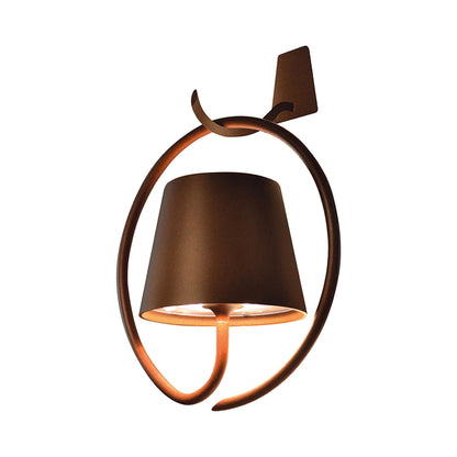 Poldina Magnetic Outdoor LED Rechargeable Wall Light with Mounting Hook and Ring in Rust.