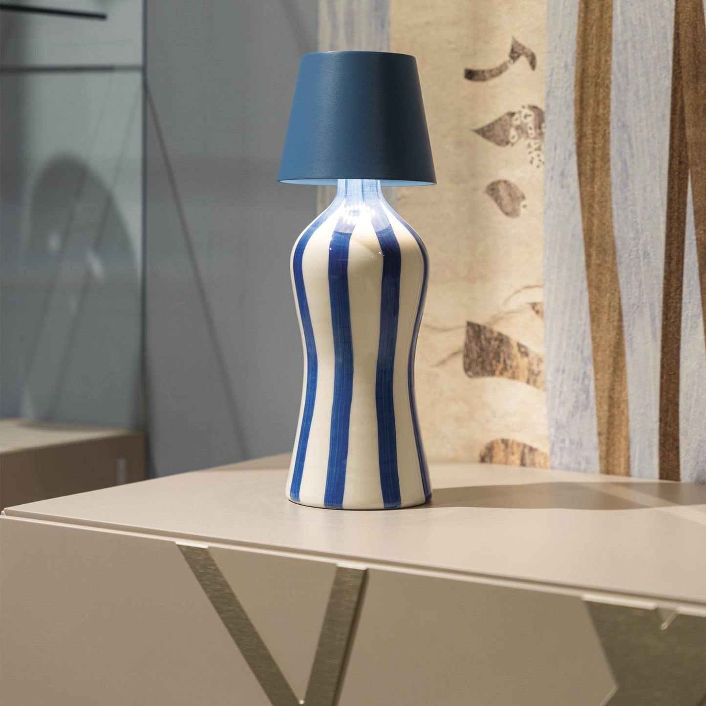 Poldina Pro Lido Bottle Outdoor Rechargeable LED Table Lamp in dining room.