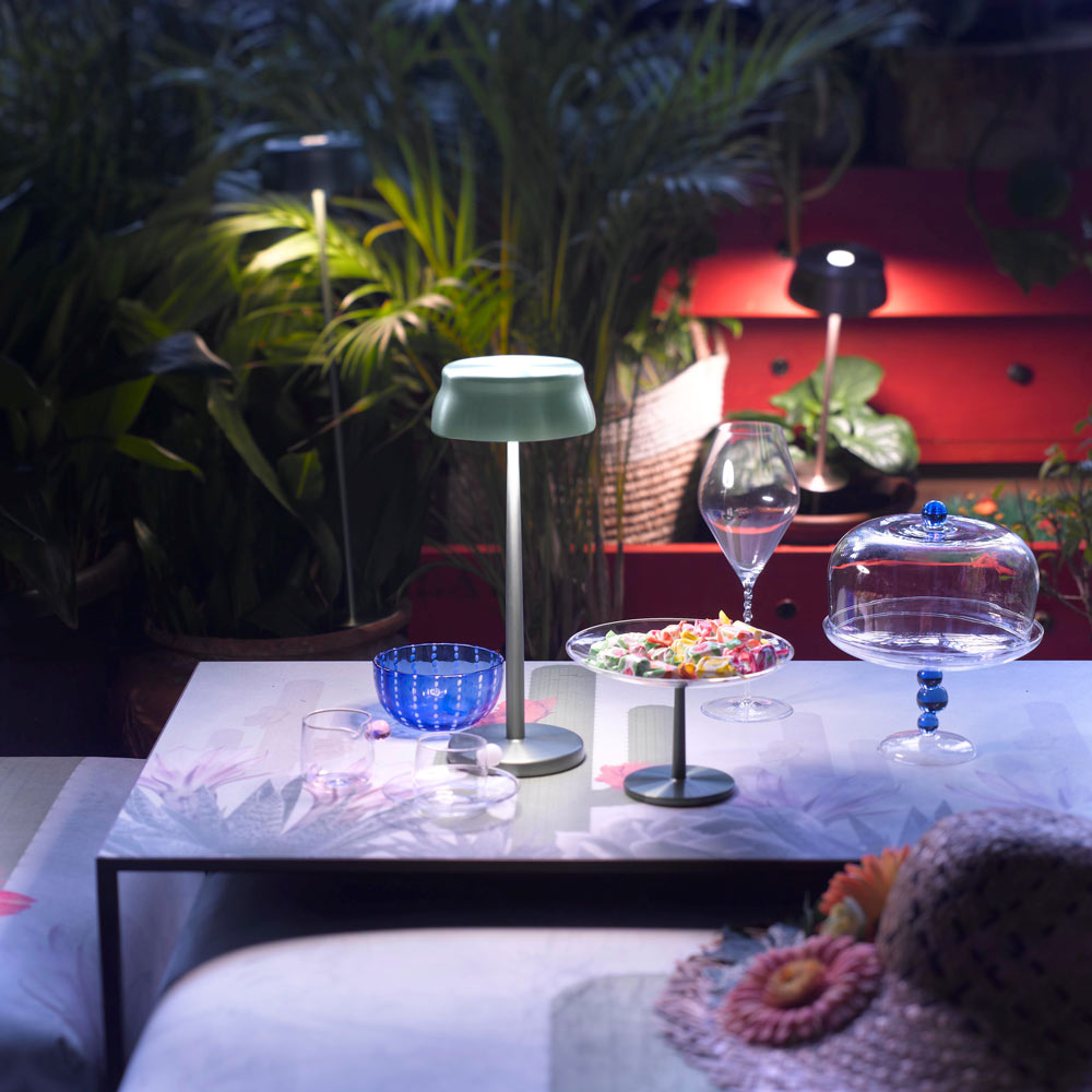 Sister LED Portable Table Lamp in Outside Area.
