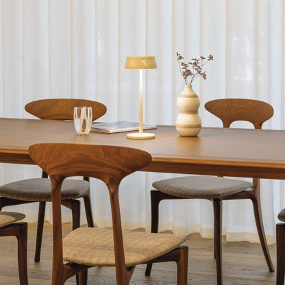 Sister Light Wi-Fi Outdoor Rechargeable LED Table Lamp in dining room.