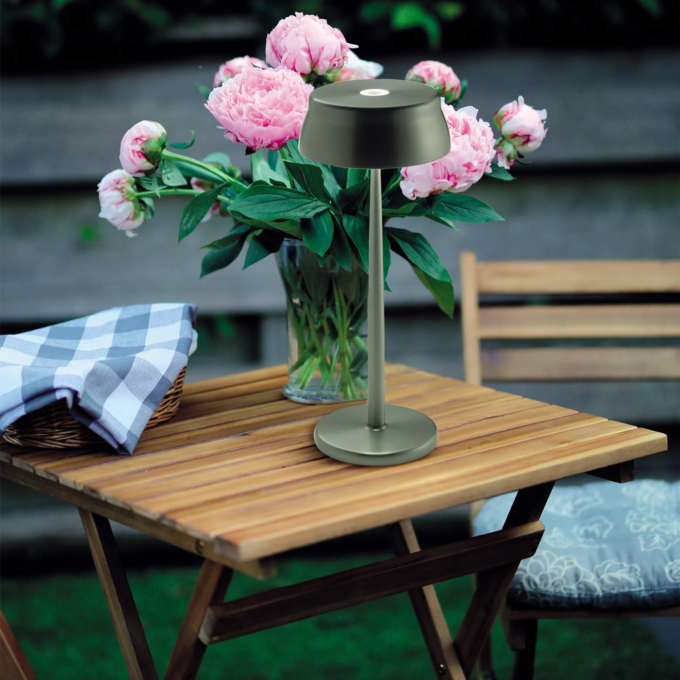 Sister Light Wi-Fi Outdoor Rechargeable LED Table Lamp in Outdoor Area.