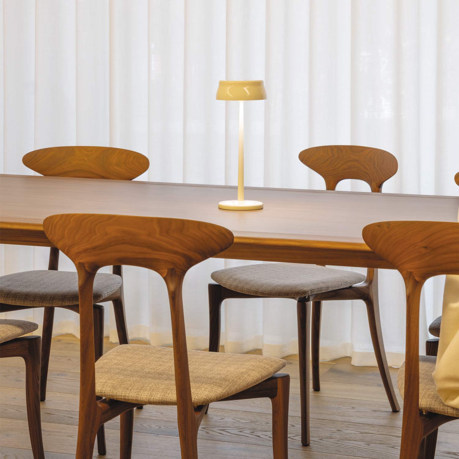 Sister Light Wi-Fi Outdoor Rechargeable LED Table Lamp in dining room.