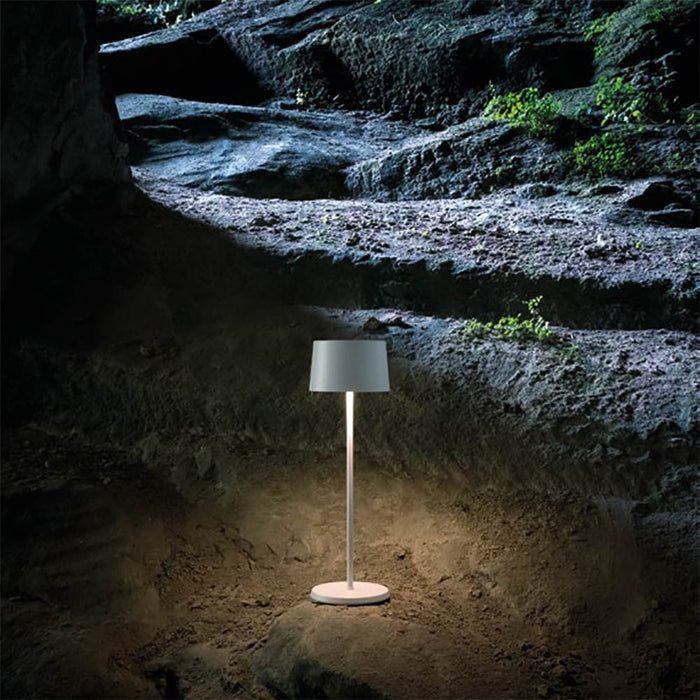 Olivia Pro LED Table Lamp in Outside Area.