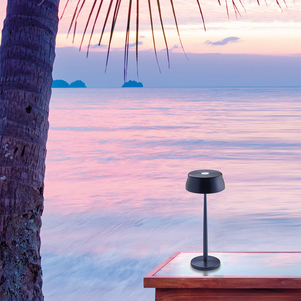 Sister LED Portable Table Lamp in beach.