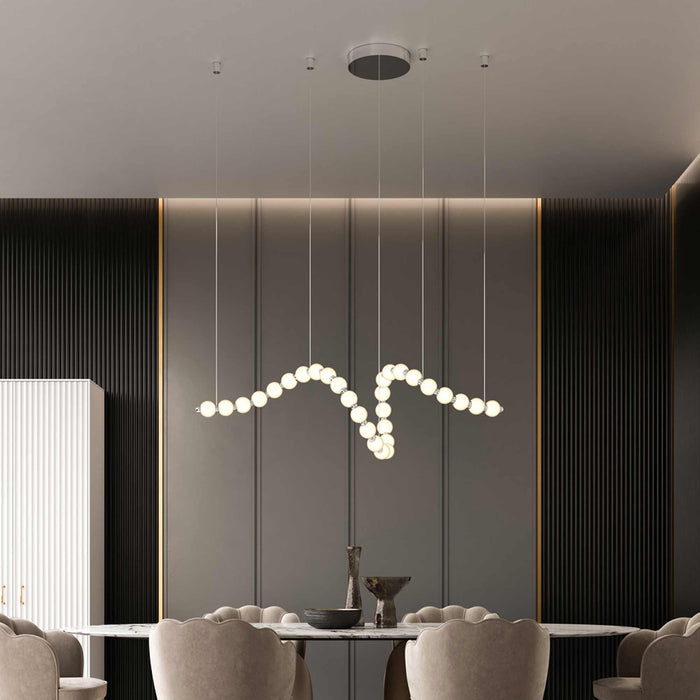 Akoya LED Linear Pendant Light in dining room.