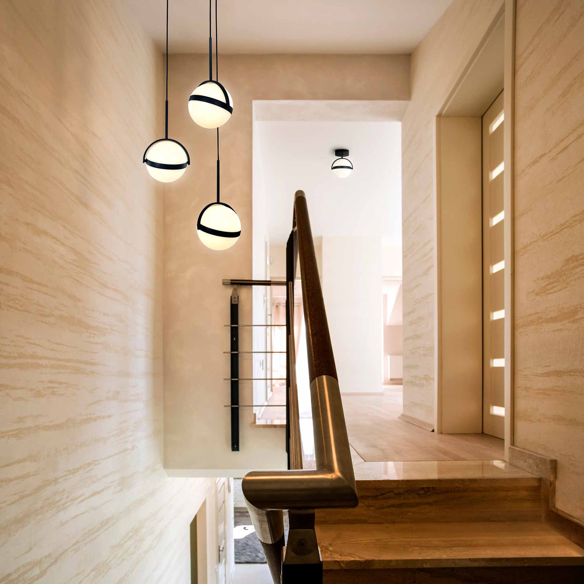 Globo Multi-Light LED Pendant Light in stairs.