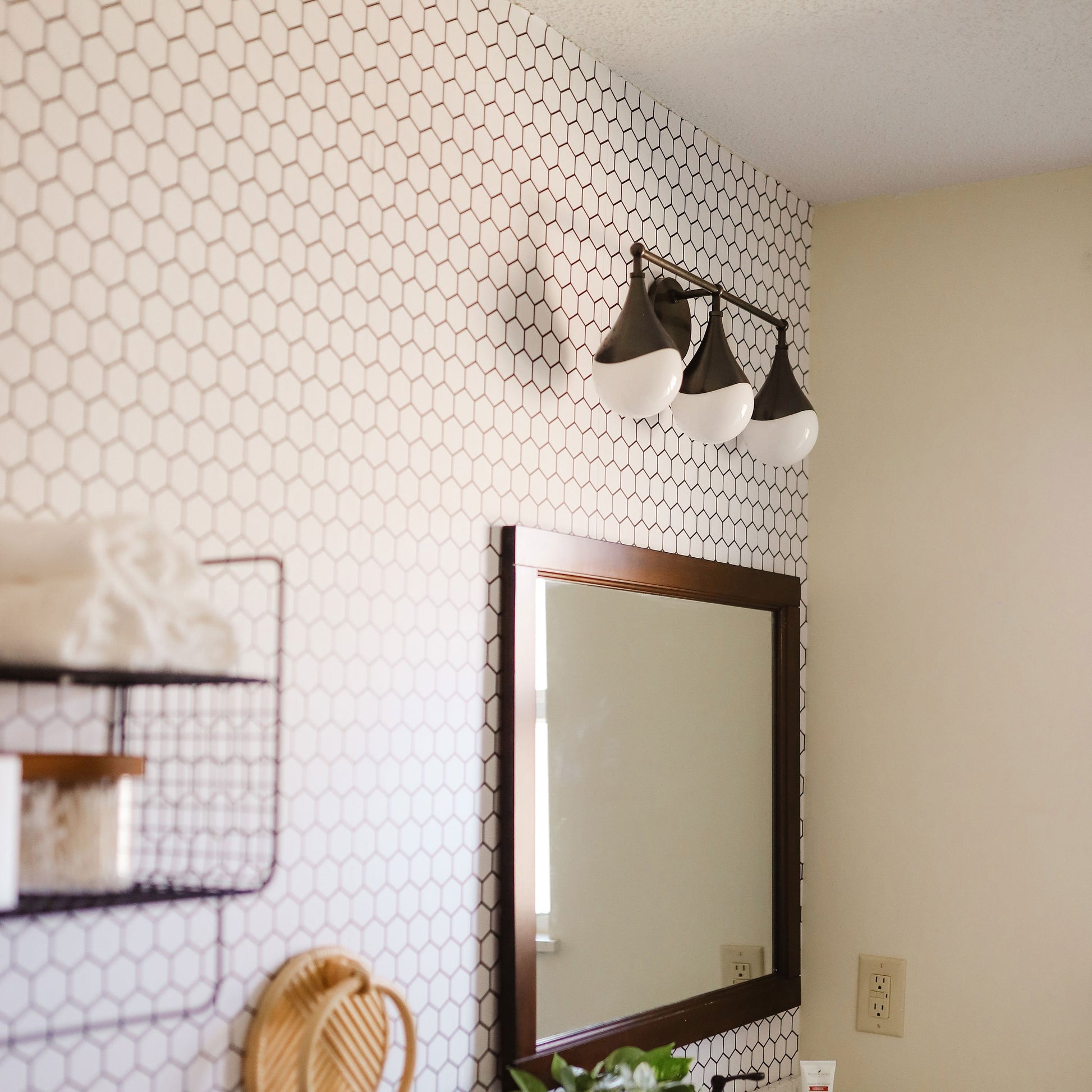 Ariana LED Bath Vanity Light in bathroom.