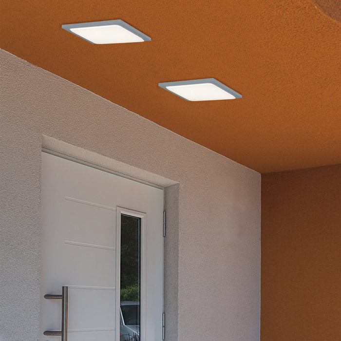 Trave Outdoor LED Patio Light in hallway.