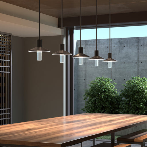 Ash Outdoor LED Pendant Light with Clear Cylinder in dining room.