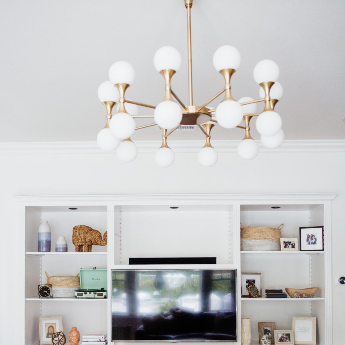 Astoria LED Chandelier in living room.