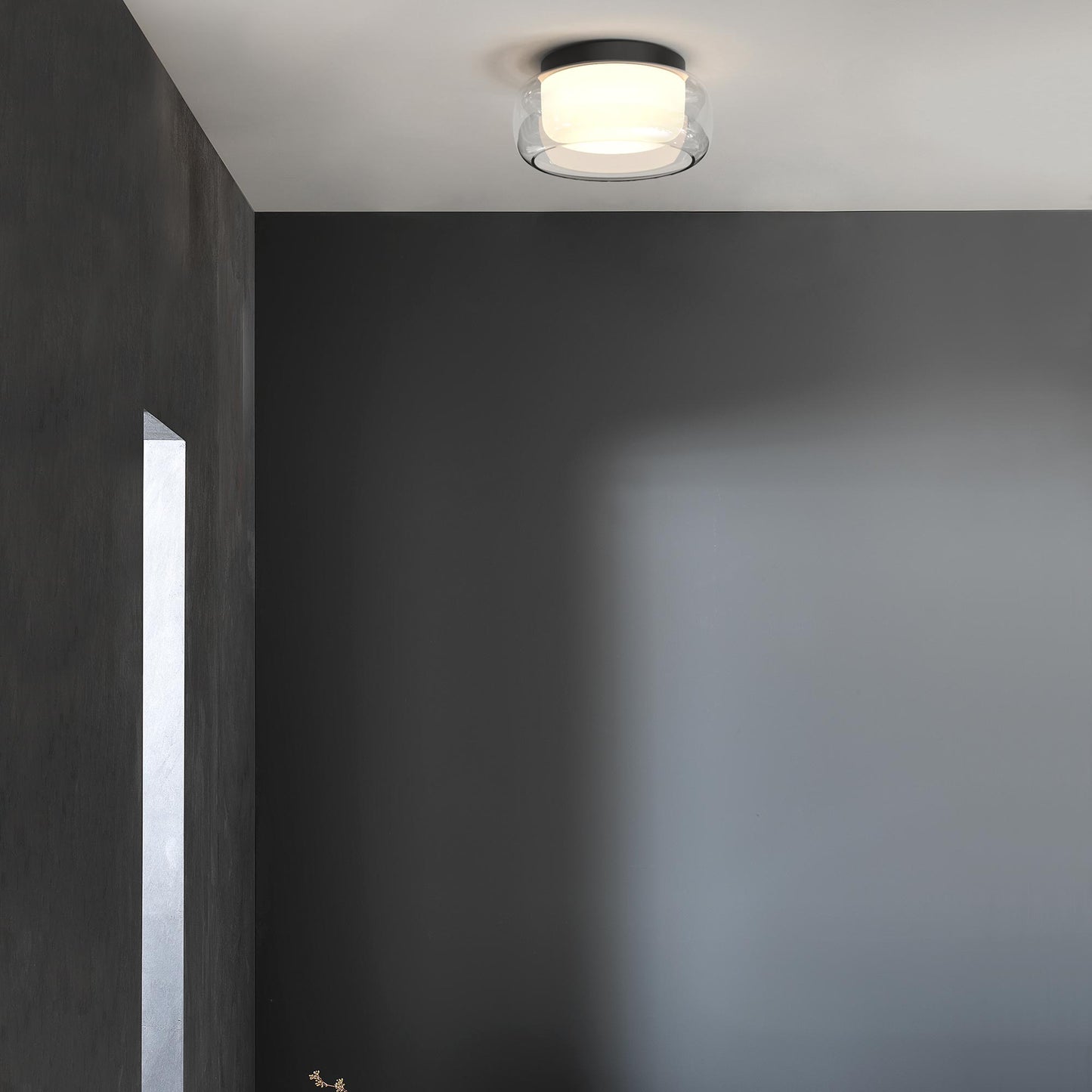 Aquina LED Semi Flush Mount Ceiling Light in bathroom.